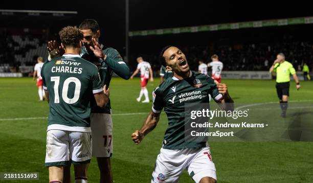 Bolton Wanderers' Josh Dacres-Cogley celebrates his side's fourth goal scored by Dion Charles during the Sky Bet League One match between Stevenage...