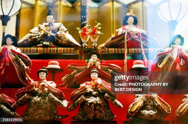 traditional japanese hina dolls display - momo no sekku stock pictures, royalty-free photos & images
