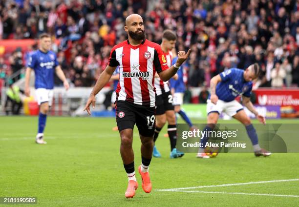 Bryan Mbeumo of Brentford celebrates after scoring his team's third goal from the penalty spot during the Premier League match between Brentford FC...