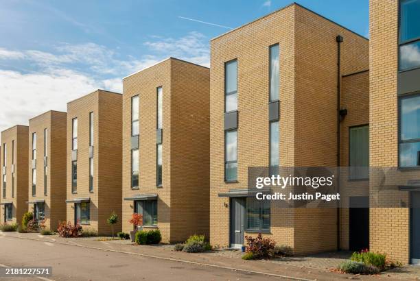 a row of newly build terraced houses in the uk - modern stock pictures, royalty-free photos & images