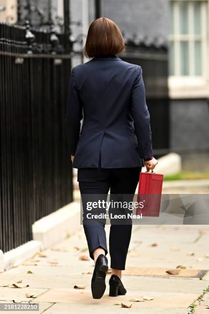 Chancellor of the Exchequer, Rachel Reeves, carries the red Budget Box as she leaves 11 Downing Street to present the government's annual budget to...