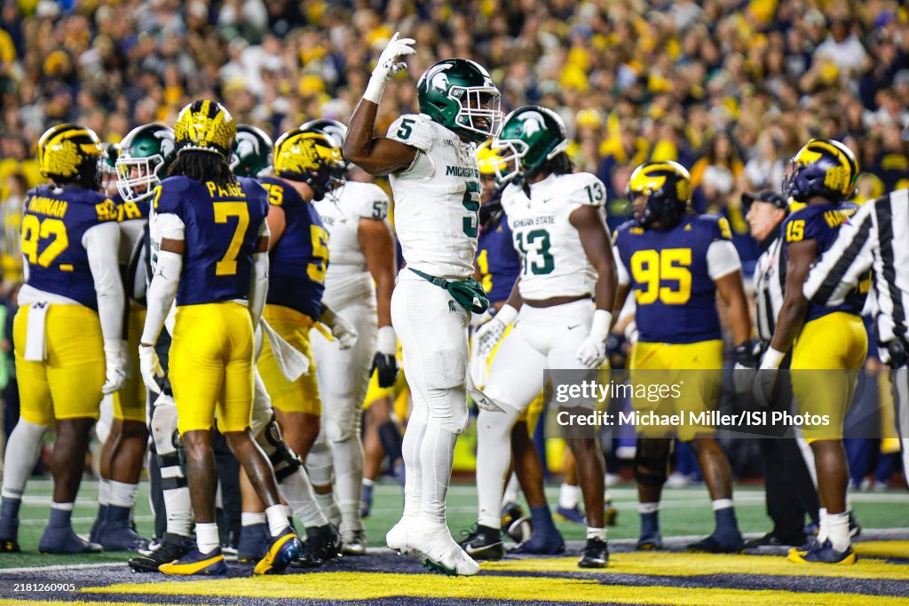 Java Carter Michigan Nathan Carter of Michigan States celebrates his touchdown during a ...
