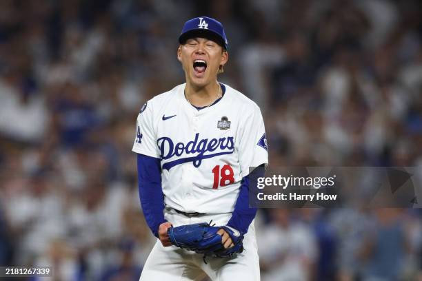 Yoshinobu Yamamoto of the Los Angeles Dodgers reacts after striking out Aaron Judge of the New York Yankees in the sixth inning during Game Two of...
