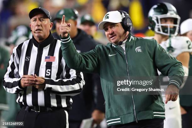 Head coach Jonathan Smith of the Michigan State Spartans reacts during the third quarter against the Michigan Wolverines at Michigan Stadium on...