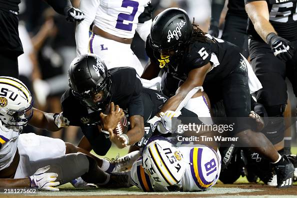 Marcel Reed Rushing Marcel Reed of the Texas A&M Aggies rushes for a touchdown in the ...