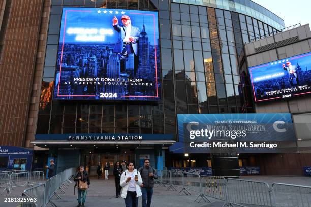 Billboards for Republican presidential nominee, former U.S. President Donald Trump are seen before a campaign rally at Madison Square Garden on...
