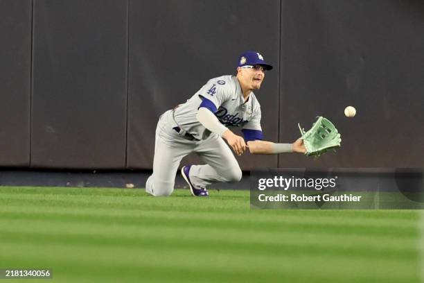 Los Angeles Dodgers Enrique Hernández catches New York Yankees designated hitter Giancarlo Stanton fly ball in the first inning. Game 5 of the World...