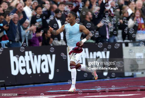 Crysencio Summerville of West Ham United celebrates scoring his team's first goal as he runs to the West Ham United technical area through Bubbles,...