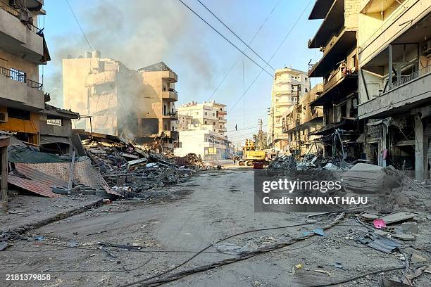 Smoke rises from the rubble of overnight's Israeli airstrikes that targeted the southern Lebanese village of Abbassiyeh on October 31 amid the...
