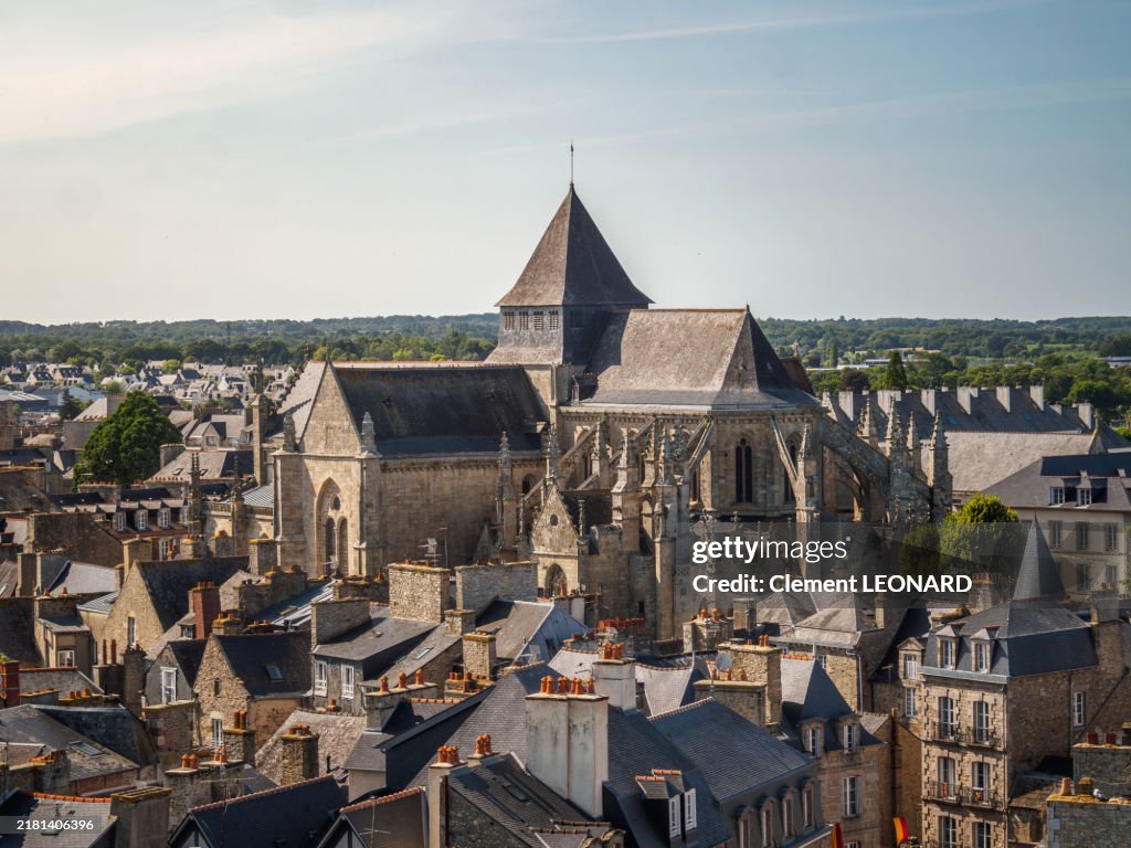 Aerial view of the Saint-Malo Church (Église Saint Malo), a flamboyant gothic catholic church, with the medieval old town of Dinan in the foreground, Cotes-d'Armor - Bretagne (Brittany).