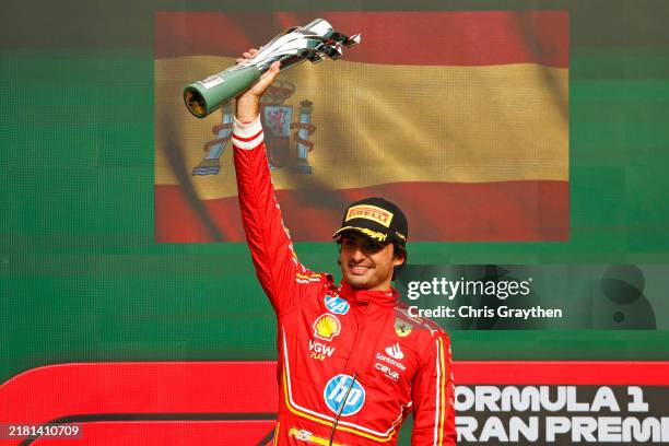 Race winner Carlos Sainz of Spain and Ferrari celebrates on the podium after the F1 Grand Prix of Mexico at Autodromo Hermanos Rodriguez on October...