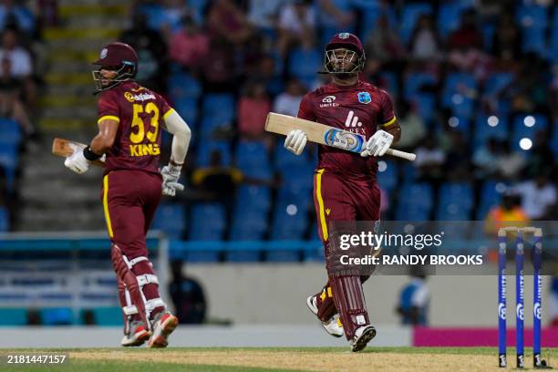 Evin Lewis and Brandon King of West Indies hit 50 runs partnership during the 1st ODI between West Indies and England at Vivian Richards Cricket...