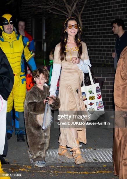 Anne Hathaway and son Jack Shulman are seen on October 31, 2024 in New York City.