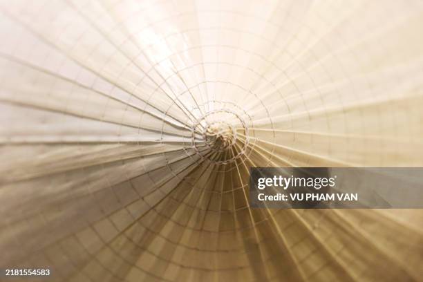 decoration vietnamese conical straw hats in white with illuminated night light - sharp point stock pictures, royalty-free photos & images