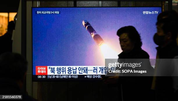 Hour Yonhapnews TV broadcast at Yongsan Railway Station in Seoul showing a news broadcast of a test launch of new intercontinental ballistic missile...