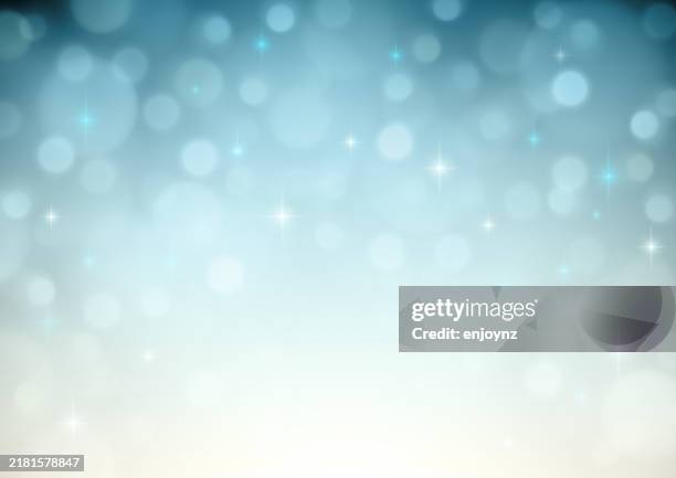 sparkling light blue winter christmas light background - soft wedding background stock illustrations