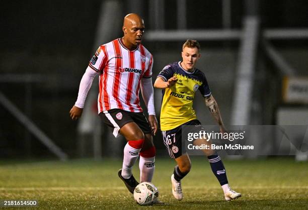 Derry , United Kingdom - 1 November 2024; Andre Wisdom of Derry City in action against Liam Burt of Shelbourne during the SSE Airtricity Men's...