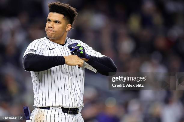 Juan Soto of the New York Yankees reacts after grounding out against the Los Angeles Dodgers in the third inning during Game Three of the 2024 World...