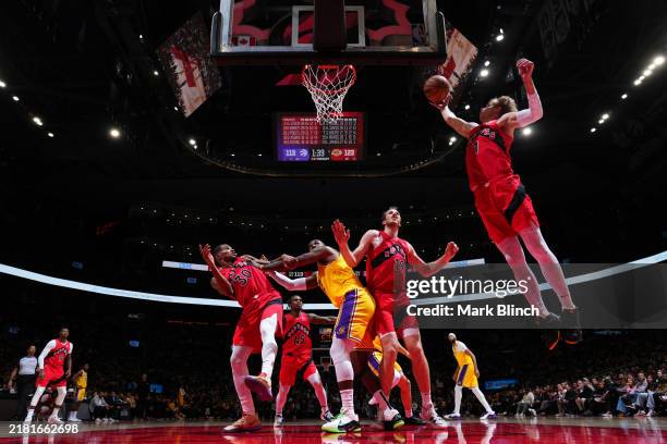 Gradey Dick of the Toronto Raptors goes up for the rebound during the game against the Los Angeles Lakers on November 1, 2024 at the Scotiabank Arena...