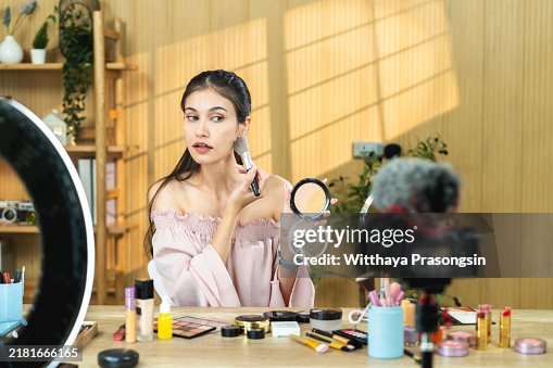 Beauty Influencer Recording Makeup Tutorial in Studio Setting Beauty Influencer Recording Makeup Tutorial in Studio Setting
