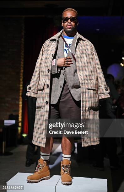 Enzo Jiovarni Holm attends the NOM!NAL London AW24 Disco Noir Fashion Show at Blue Marlin Ibiza London on November 1, 2024 in London, England.