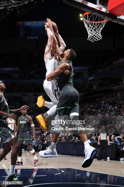 Christian Braun of the Denver Nuggets dunks the ball during the game against the Minnesota Timberwolves on November 1, 2024 at Target Center in...