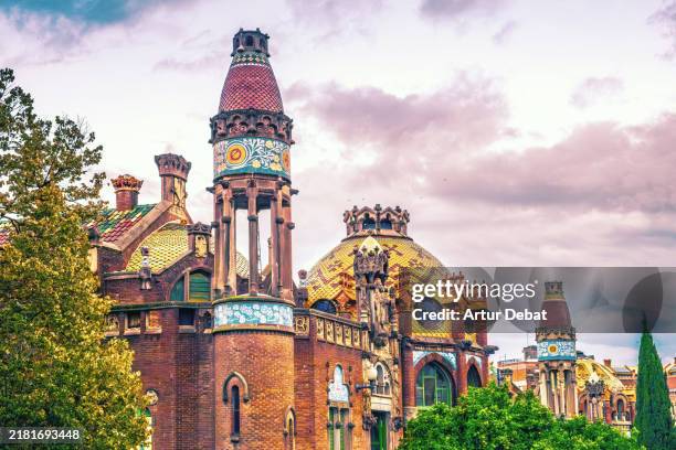 majestic barcelona architecture of hospital sant pau with art nouveau decoration - antoni gaudí stock pictures, royalty-free photos & images