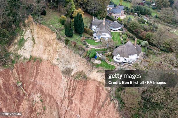 Cottage, sitting 10-metres from a cliff edge with a 400ft drop, following a small rockfall directly below and a significantly large cliff colapse a...