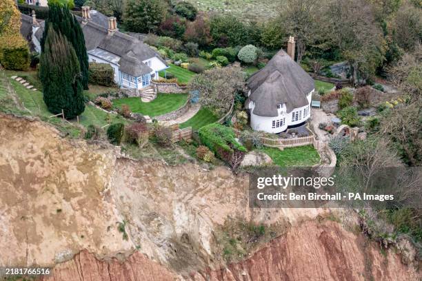 Cottage, sitting 10-metres from a cliff edge with a 400ft drop, following a small rockfall directly below and a significantly large cliff colapse a...