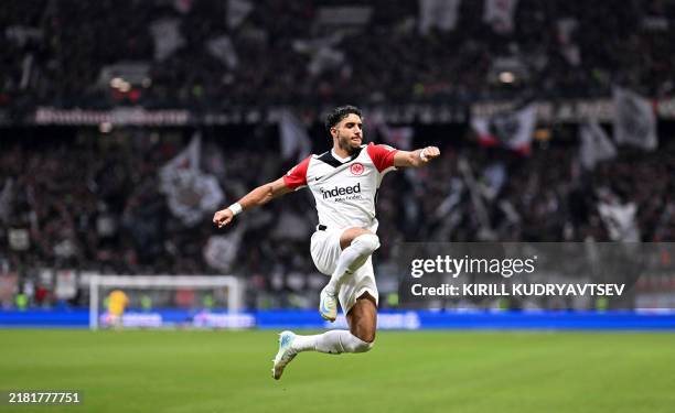 Frankfurt's Egyptian forward Omar Marmoush celebrates after scoring during the German first division Bundesliga football match between Eintracht...