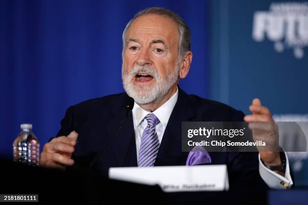 Former Arkansas Governor Mike Huckabee moderates a roundtable discussion with Republican presidential nominee, former U.S. President Donald Trump at...