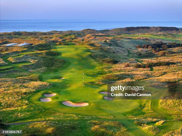 An aerial view of the 165 yards par 3, 13th hole 'Feather Bed' with the 360 yards par 4, 17th hole 'Purgatory' behind at Royal Portrush Golf Club on...