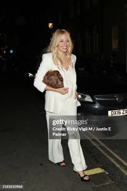 Sienna Miller is seen leaving Louie restaurant on October 29, 2024 in London, England.