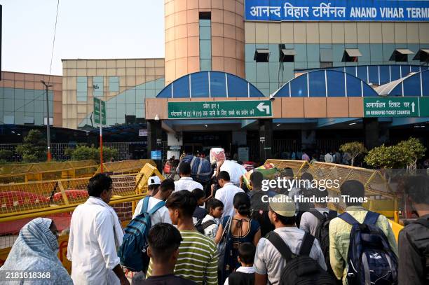 Passengers in large number at Anand Vihar Railway Station to board train for their hometown, ahead of Chhath Puja, on November 2, 2024 in New Delhi,...