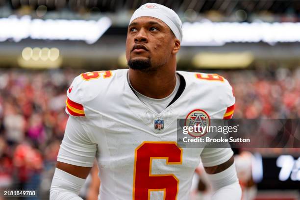 Safety Bryan Cook of the Kansas City Chiefs stands on the sidelines during the national anthem prior to an NFL football game against the Las Vegas...