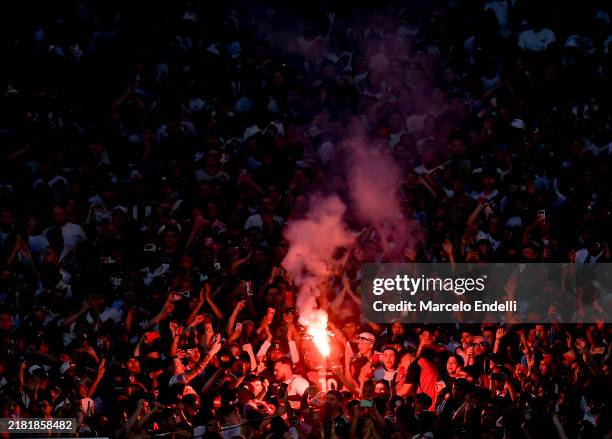 Fans of River Plate cheer with flares during a Liga Profesional 2024 match between River Plate and Banfield at Estadio Antonio Vespucio Liberti on...