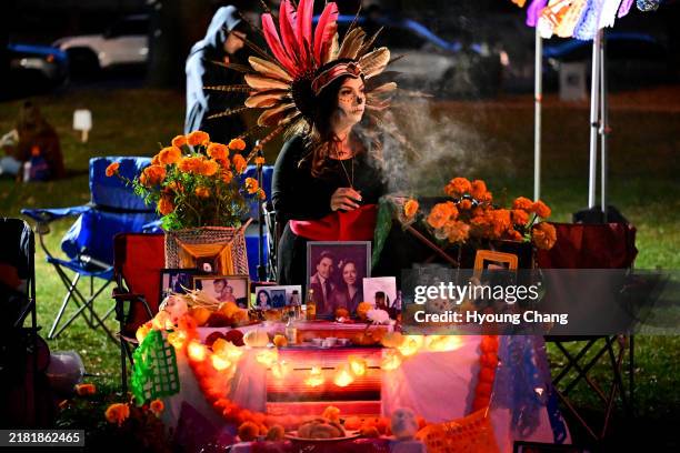 Gina Sandoval-Ortega had set the altar for Dia De Los Muertos at La Raza Park in Denver, Colorado on Friday, November 1, 2024.