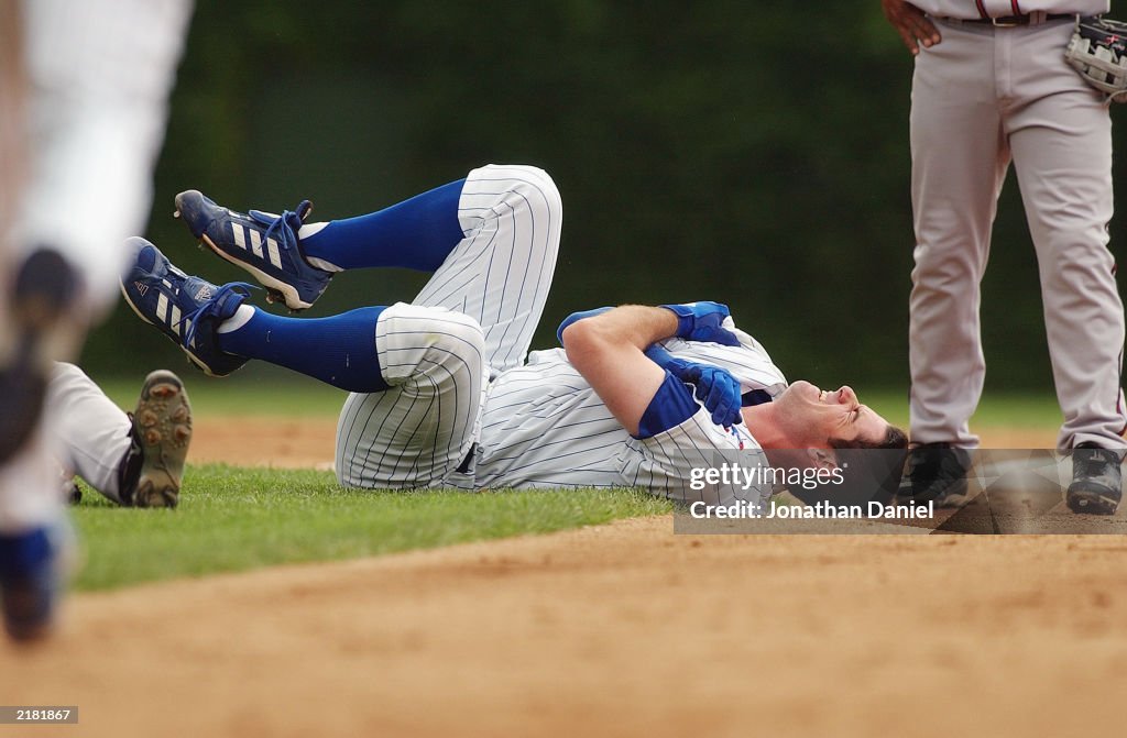 Prior grabs shoulder in pain
