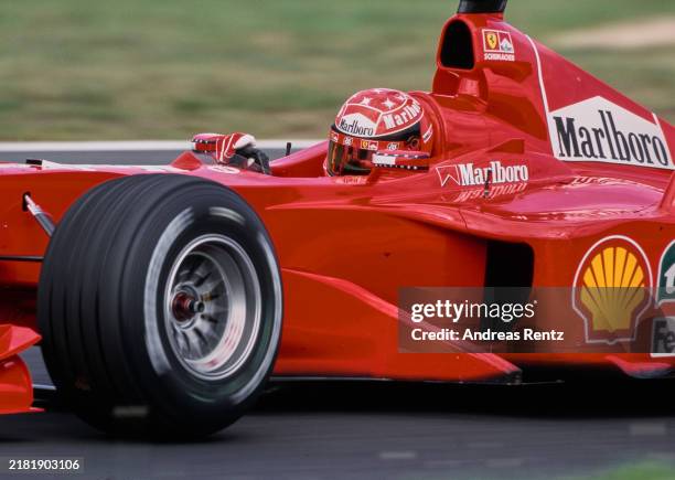 Tight cockpit side view of Michael Schumacher from Germany driving the Scuderia Ferrari Marlboro Ferrari F1-2000 Ferrari V10 during the Formula One...