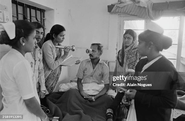 Eleven days after a cloud from the Union Carbide plant carrying methyl isocyanate gas seriously injured 20,000 people and killed 3000, the resumption...