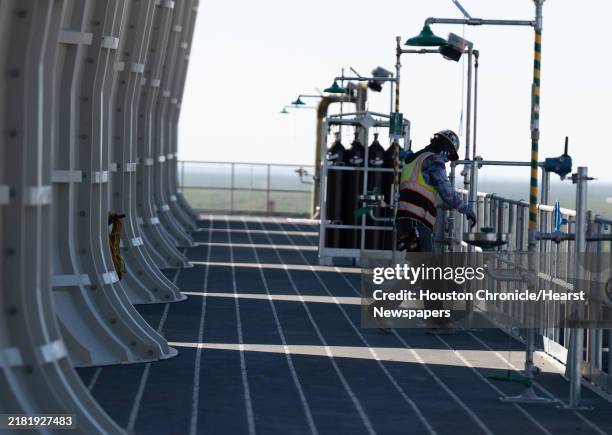 Employees work on Statos, a carbon capture facility by Occidental in West Texas on Thursday, Oct. 3, 2024 in Ector County.