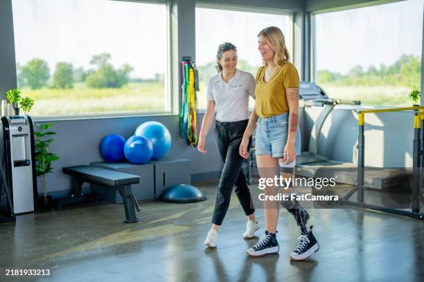 working on mobility - amputee stock pictures, royalty-free photos & images