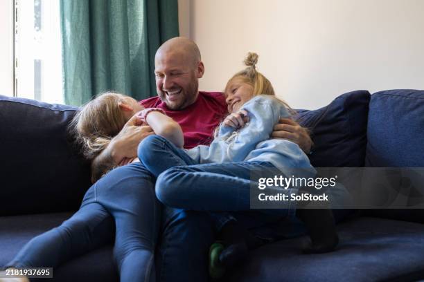 making childhood memories - father and daughter tattoos stock pictures, royalty-free photos & images