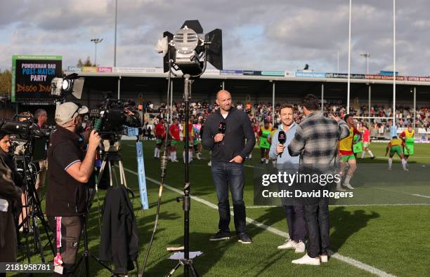 Rugby presenters present pitchside during the Gallagher Premiership Rugby match between Exeter Chiefs and Harlequins at Sandy Park on October 27,...