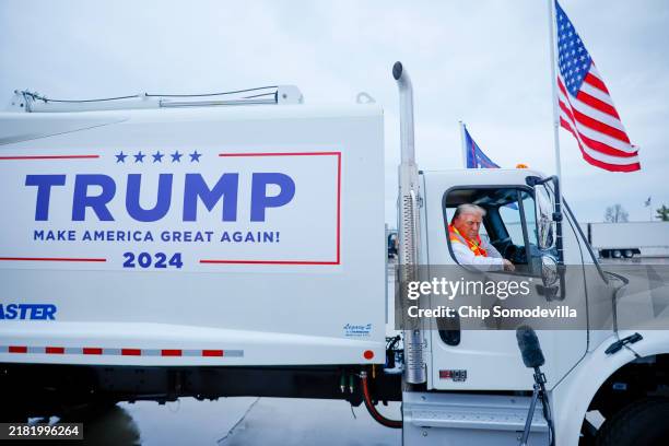 Republican presidential nominee, former President Donald Trump holds a press conference from inside trash hauler at Green Bay Austin Straubel...