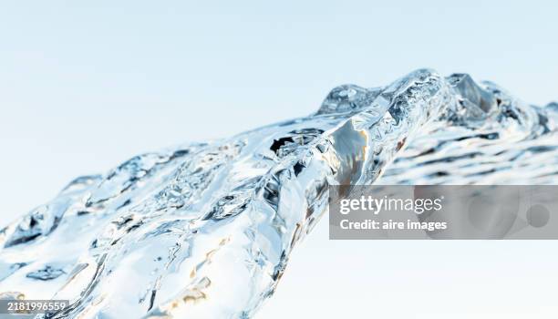 side view of a splash of water in mid-flight in close-up of a three-dimensional rendering image - vatten bildbanksfoton och bilder