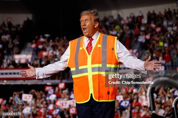 Republican presidential nominee, former President Donald Trump greets supporters during a campaign event at the Resch Center on October 30, 2024 in...