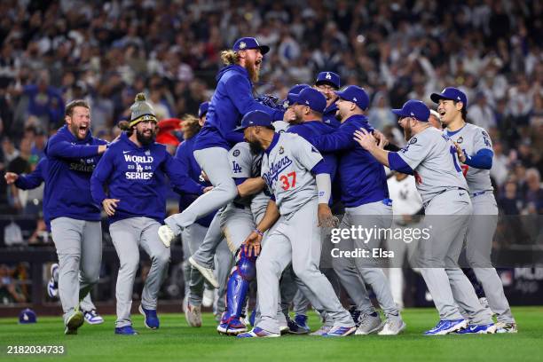The Los Angeles Dodgers celebrate as the they defeat the New York Yankees 7-6 in game 5 to win the 2024 World Series at Yankee Stadium on October 30,...
