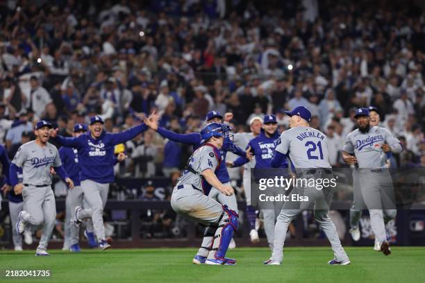 The Los Angeles Dodgers celebrate as the they defeat the New York Yankees 7-6 to win Game Five and the 2024 World Series at Yankee Stadium on October...