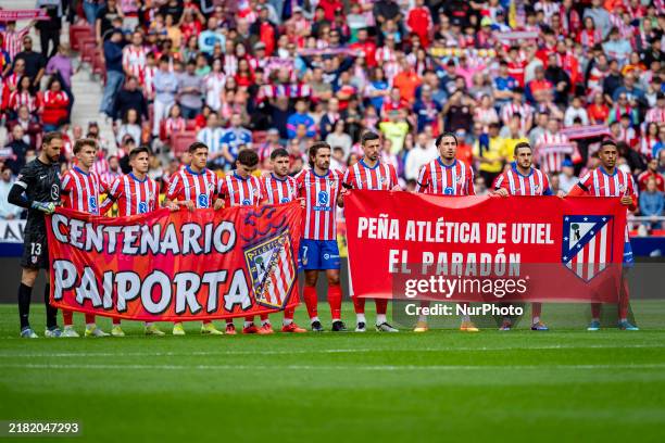 The Atletico de Madrid team observes a minute of silence dedicated to the victims of the DANA that hit the Valencia area last week during the La Liga...